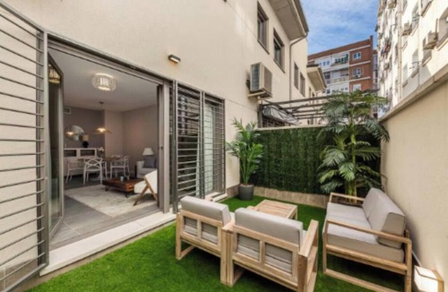 Pacifico Apartment | Stylish Three-Level Home with Patio and Garage in Central Madrid