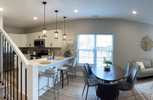 Dahlman Condo | Stylish Townhouse with Rooftop Patio & Garage