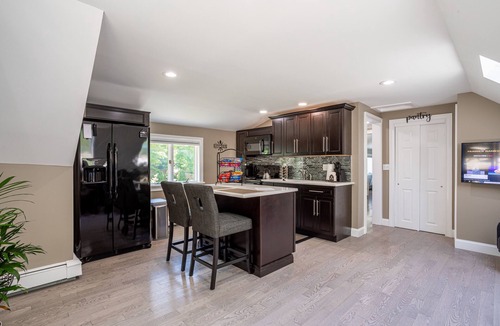 Huntington Station Apartment | Stylish Upscale Apt w/Snack Bar & Sunny Deck