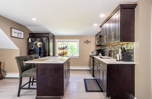 Huntington Station Apartment | Stylish Upscale Apt w/Snack Bar & Sunny Deck