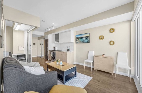 Garden District Apartment | Suite Mia: Medical District 2BR Walk to St. Mike’s