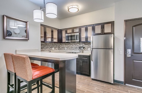 Lubbock Condo | Suite Near Texas Tech. Free Breakfast Buffet Every Morning.