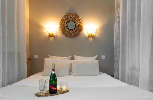 Nemours Apartment | Suite sensuelle balnéothérapie et fauteuil tantra