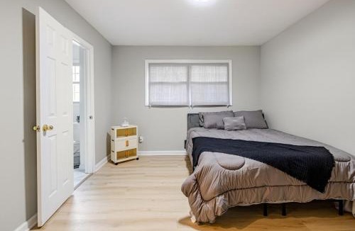 Mableton House | Suite with Smart Tv Fireplace and Mini Fridge