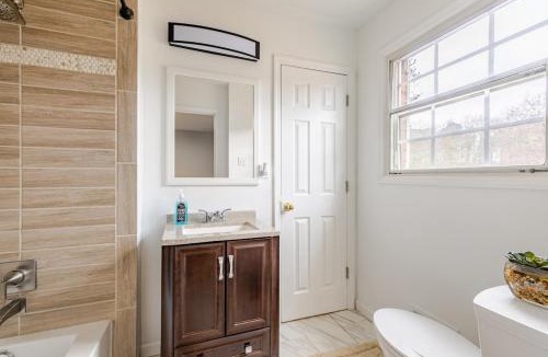 Mableton House | Suite with Smart Tv Fireplace and Mini Fridge