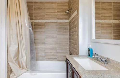 Mableton House | Suite with Smart Tv Fireplace and Mini Fridge