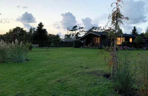Hundested House | Summer bliss with vibrant garden in Nødebohuse