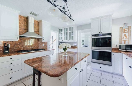 River District House | Summer Deals! 4/3.5 Heated Pool Home Close to Everything!