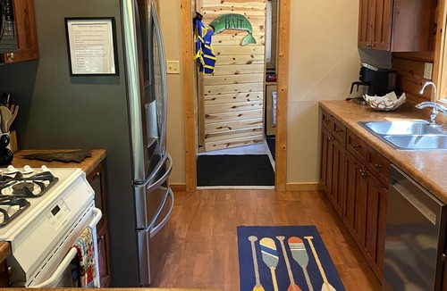 Manhattan Beach Cabin | SUMMER fun in a cozy log lake home on the Whitefish Chain under the tall pines
