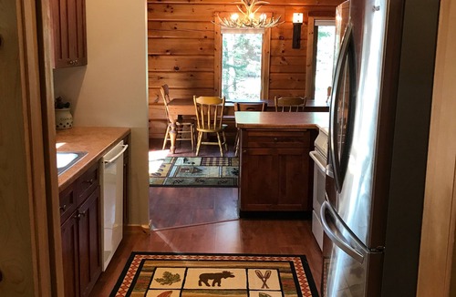 Manhattan Beach Cabin | SUMMER fun in a cozy log lake home on the Whitefish Chain under the tall pines