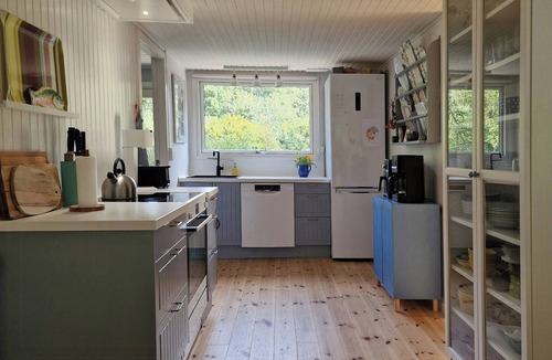 Norddjurs Municipality House | Summer house in Skovgårde with forest view