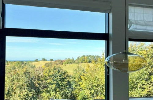 Faarevejle House | Summer house on hillside plot by Sejerø Bay