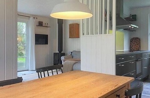 Hoeve Strand House | Summer house with sunset over Sejerø Bay