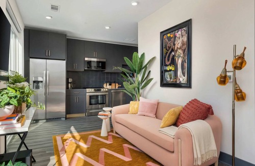 Rolling Mill Hill Apartment | Summer rooftop deck, skyline views, indoor-outdoor living near Broadway