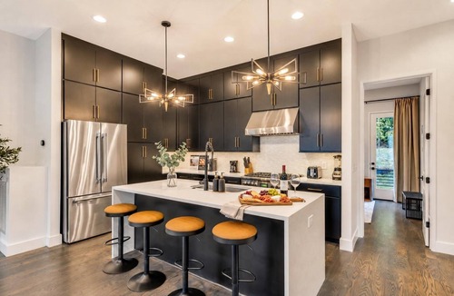 Katie Hill Neighborhood House | Summer rooftop hot tub, game room, skyline views near Broadway