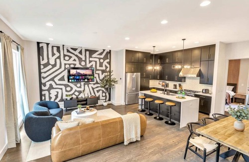 Katie Hill Neighborhood House | Summer rooftop hot tub, game room, skyline views near Broadway