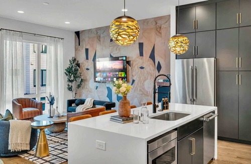 Katie Hill Neighborhood House | Summer rooftop hot tub, karaoke lounge, double decks near Broadway