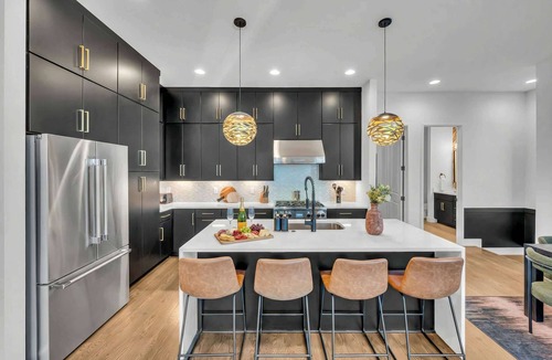 Katie Hill Neighborhood House | Summer rooftop hot tub, karaoke lounge, double decks near Broadway