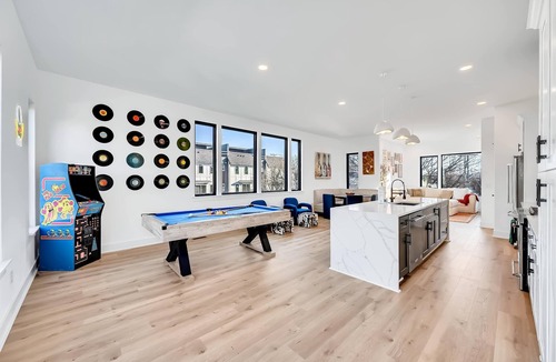 Hurwood Heights House | Summer rooftop hot tub, game room, sauna near Broadway and Geodis Park