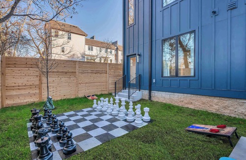 Hurwood Heights House | Summer rooftop hot tub, game room, sauna near Broadway and Geodis Park