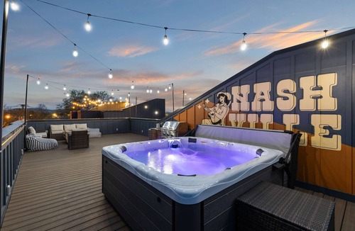 Hurwood Heights House | Summer rooftop hot tub, game room, sauna near Broadway and Geodis Park