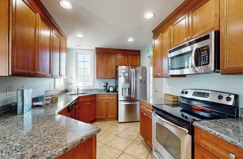 Ocean Pines House | Sun-filled retreat near beaches w/pool access golf, fireplace, W/D, & sunroom