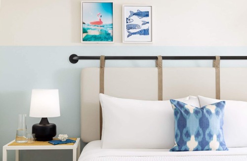 New Town Hotel | Sun, Sip, & Socialize | Island Stay w/2 Pools & Backyard Bash