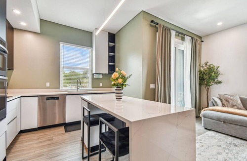 Crescent Lake Apartment | Sun Soaked Designer Condo with Patio
