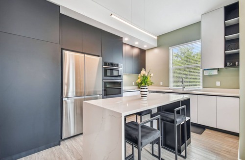 Crescent Lake Apartment | Sun Soaked Designer Condo with Patio