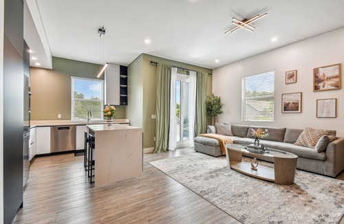 Crescent Lake Apartment | Sun Soaked Designer Condo with Patio
