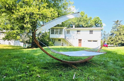 Fairview House | Sunkissed Escape Bright Sunroom + Hammock Fun