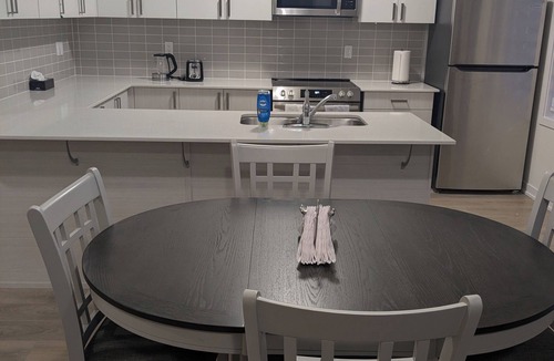Pickering House | Sunlight, Rooftop terrace with BBQ set up, close to Pickering Casino.