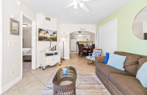 Cape Caneveral Beach Gardens Condo | Sunlit Ground‑Floor Corner Condo ☀️ Private Patio, Steps to Beach & Pool!