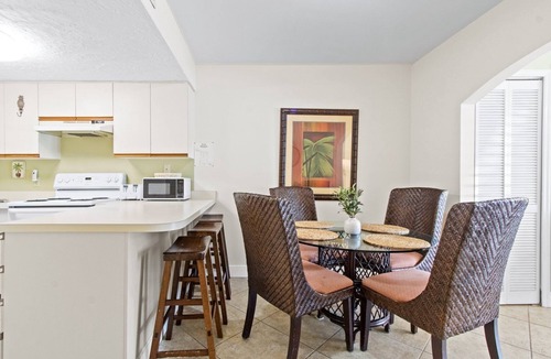 Cape Caneveral Beach Gardens Condo | Sunlit Ground‑Floor Corner Condo ☀️ Private Patio, Steps to Beach & Pool!