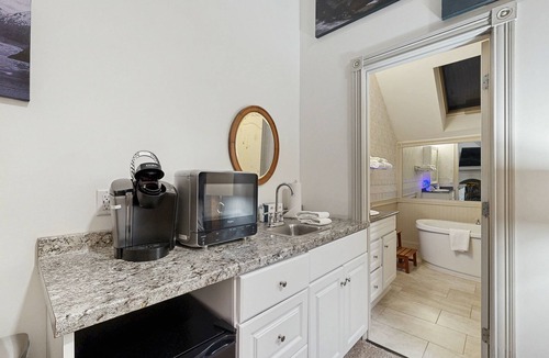 Jackson House | Sunlit Suite with a Kitchenette, Gas Fireplace, Fast WiFi, Patio, & Pool