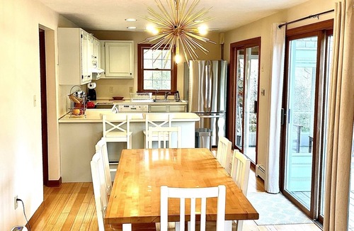 Lagoon Heights House | Sunny 3 bedroom cape with large deck, porch and kayaks. Pet friendly.