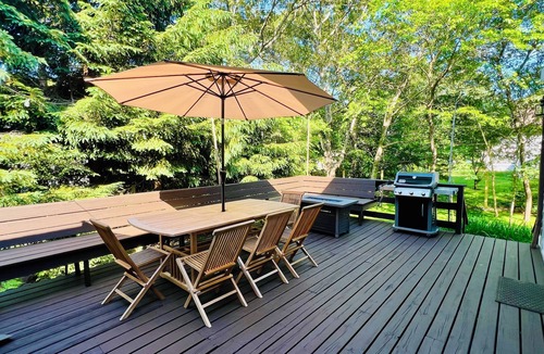 Lagoon Heights House | Sunny 3 bedroom cape with large deck, porch and kayaks. Pet friendly.