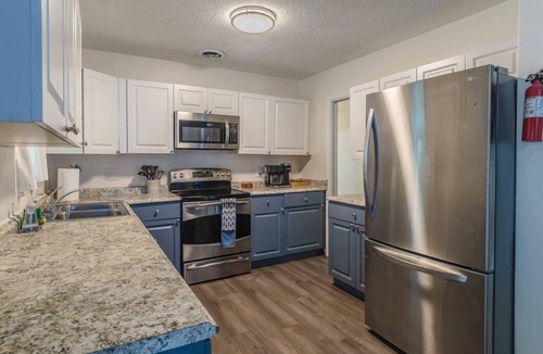 Walsingham House | Sunny 3BR escape w/tiki patio dining & yard