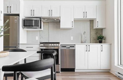 Plateau Mont Royal Apartment | Sunny Duplex Penthouse on St-Laurent Blv.