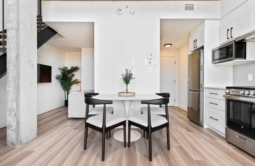 Plateau Mont Royal Apartment | Sunny Duplex Penthouse on St-Laurent Blv.