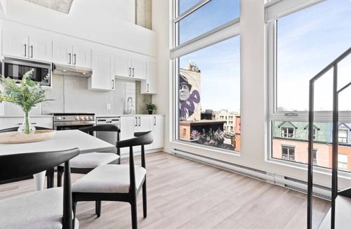 Plateau Mont Royal Apartment | Sunny Duplex Penthouse on St-Laurent Blv.