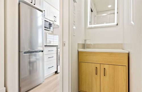 Plateau Mont Royal Apartment | Sunny Duplex Penthouse on St-Laurent Blv.