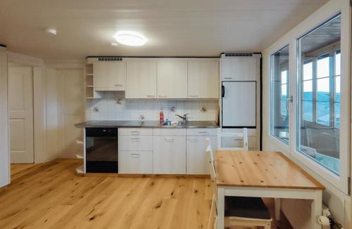 Aeschi bei Spiez Apartment | Sunny Garden - Charmantes Chalet mit Aussicht