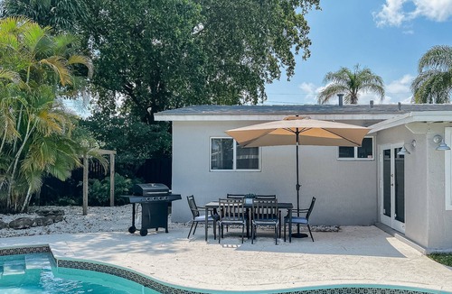 Coral Heights House | Sunny & Heated Pool Vacation Home, Beach Proximity, Cozy Beds & Wi-Fi