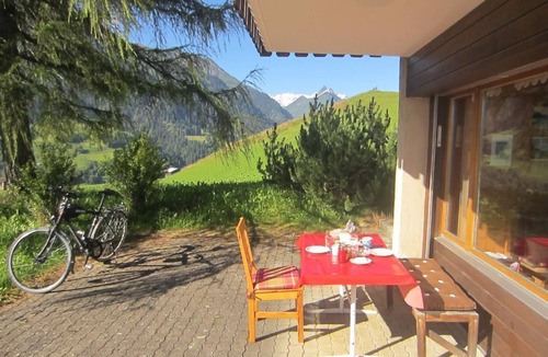 Lumnezia Apartment | Sunny holiday flat with terrace, idyllic location