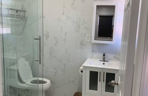 Queens House | Sunny House in Queens · Entire Home · Private Parking