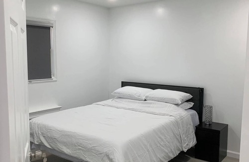 Queens House | Sunny House in Queens · Entire Home · Private Parking