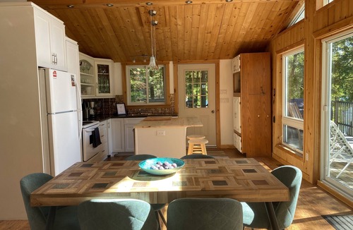 Irondale House | Sunny lakeside cottage with stunning sunset views!