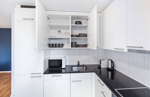 Oerlikon Apartment | Sunny Oerlikon 3.5 Room w/Balcony, 1min to Train Station, by Blueground