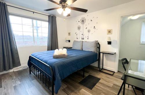 Englewood House | Sunny Queen bedroom feel like home!